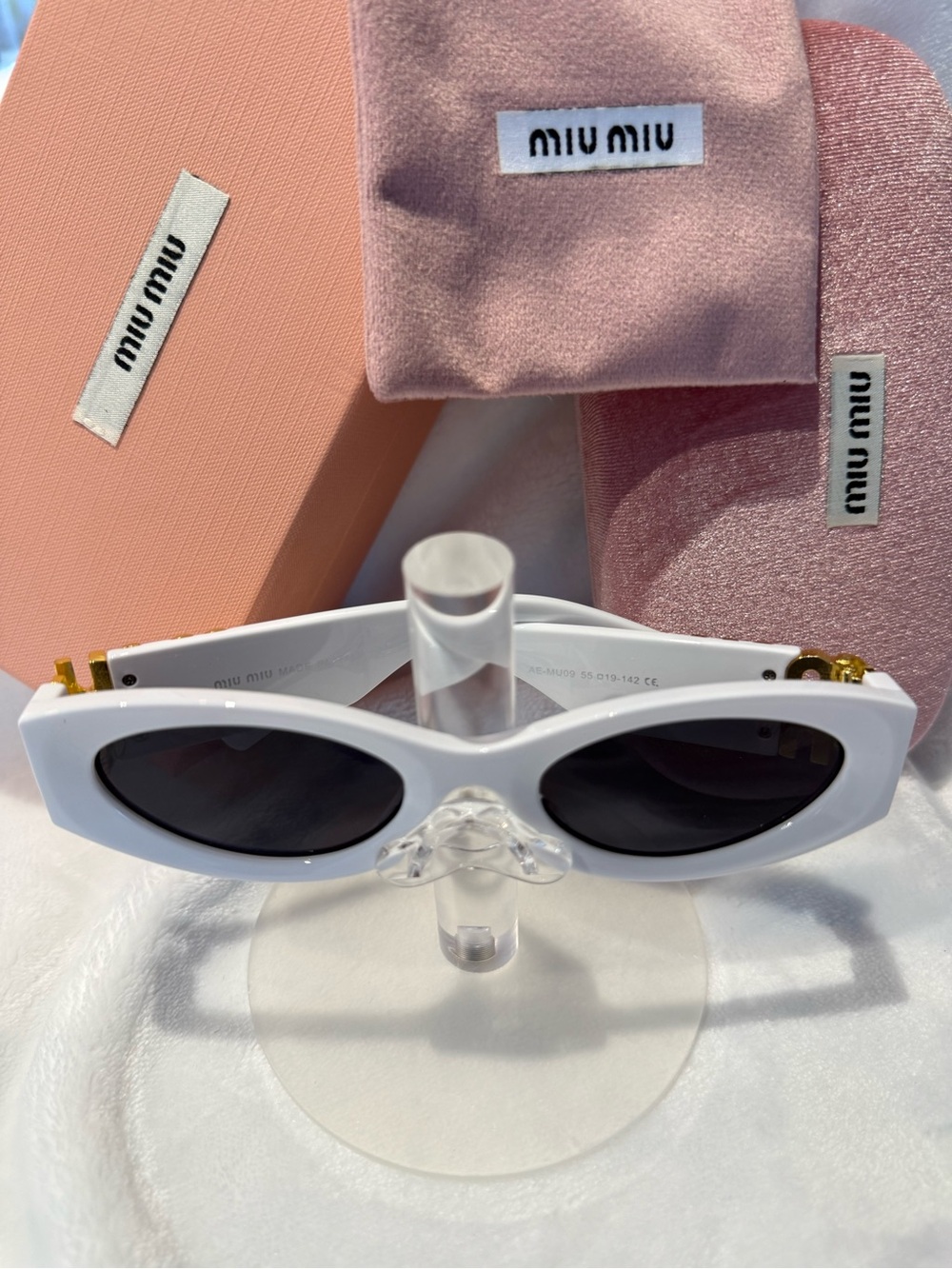 Miu Miu White Oval Sunglasses for Women - Chic Designer Shades